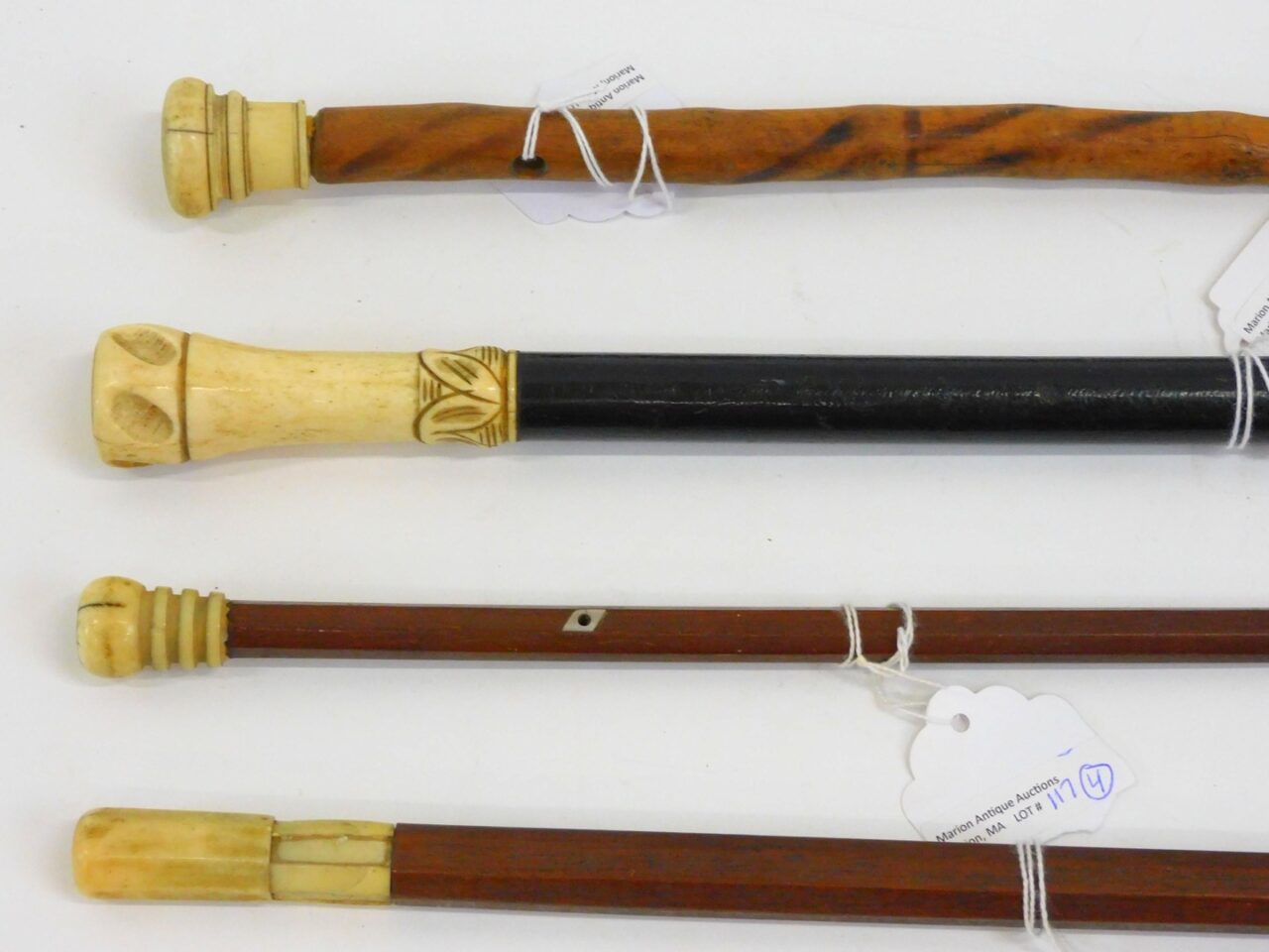 19th Century Scrimshaw Walking Sticks with Whale Tooth Knobs by Unknown Artist.