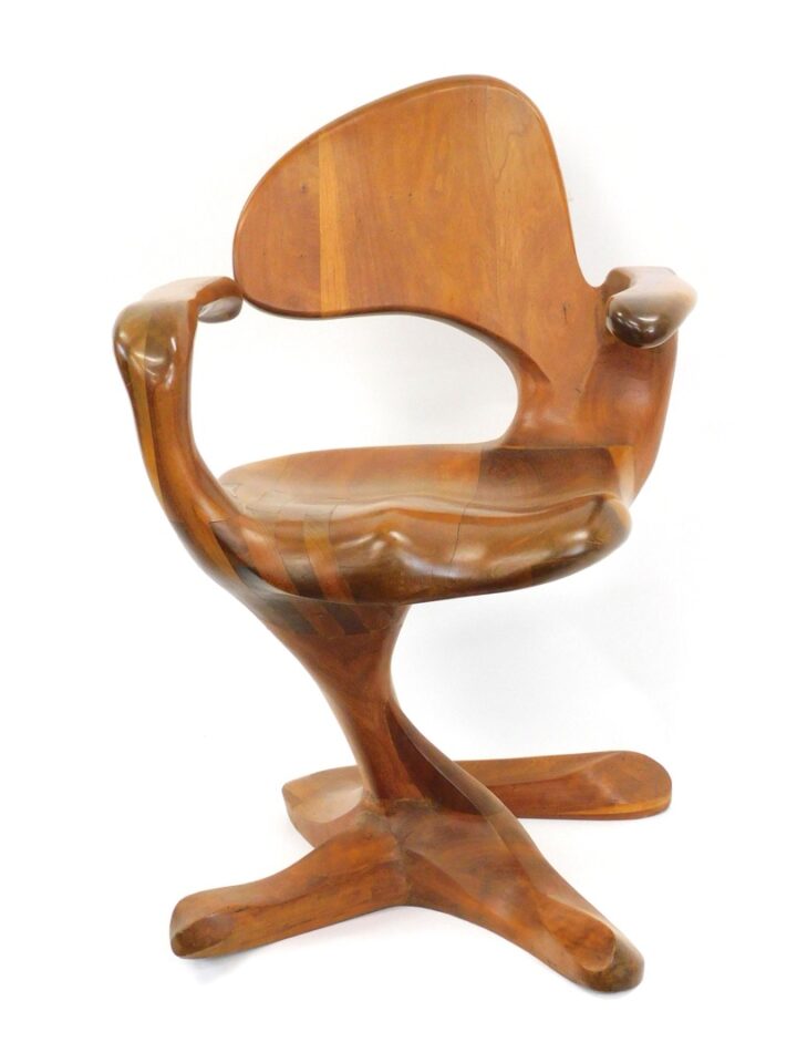 American Studio Craft Armchair by Wendell Castle and Micheal Coffey. Late 20th c. Laminated and carved cherry. Organic form.