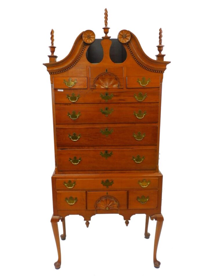 Connecticut Highboy by Amos Bradley. Second half 18th-century. Cherry with pine secondary. Flame urn finials