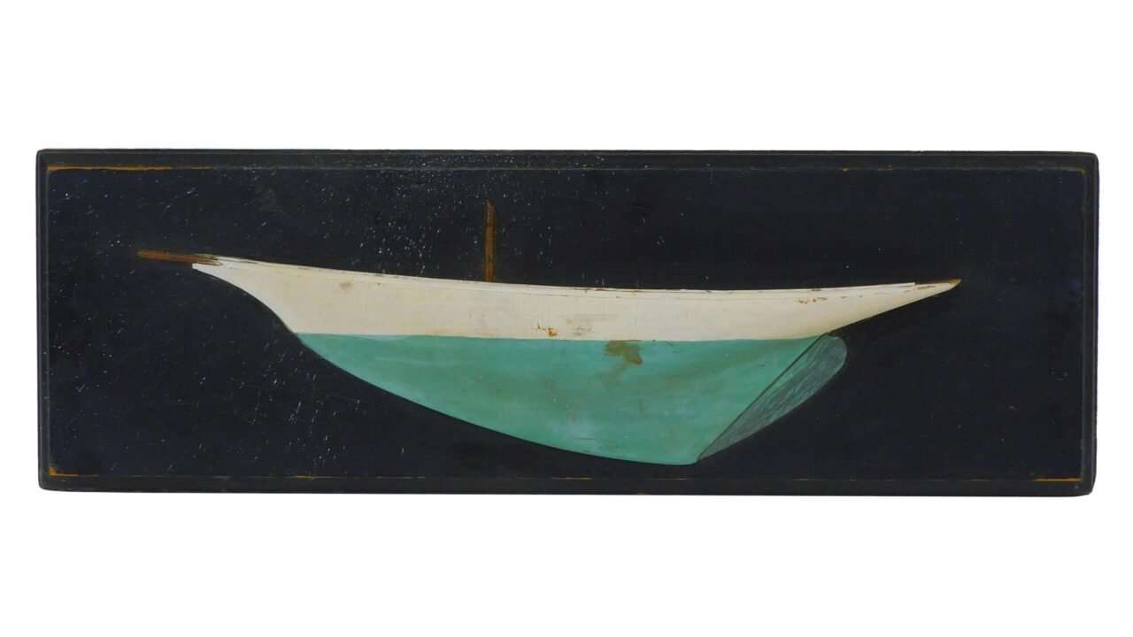 Unknown artist. Half hull ship model. Late 19th / early 20th-century. Sailboat half-model carved and painted on pine board.