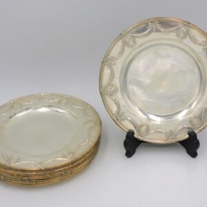 European Silver Plates by Unknown Artist. 19th century. .930 silver with swag and cameo design border. 8 1/4" diameter