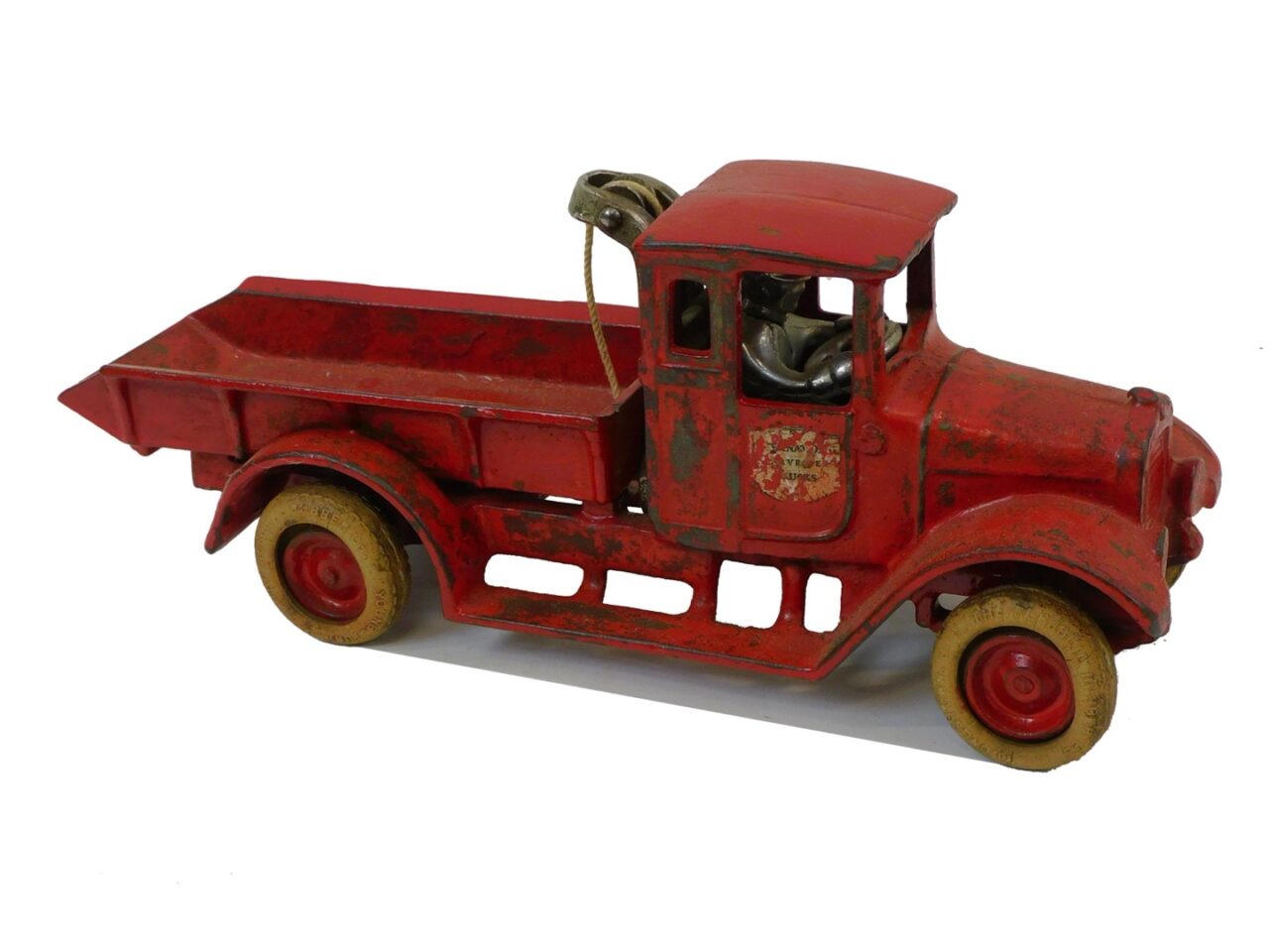 Red Baby Dump Truck by Arcade Manufacturing Co. 1920.