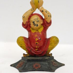 Cast Iron Figural Doorstop of Crouching Asian Man