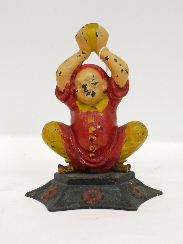 Cast Iron Figural Doorstop of Crouching Asian Man