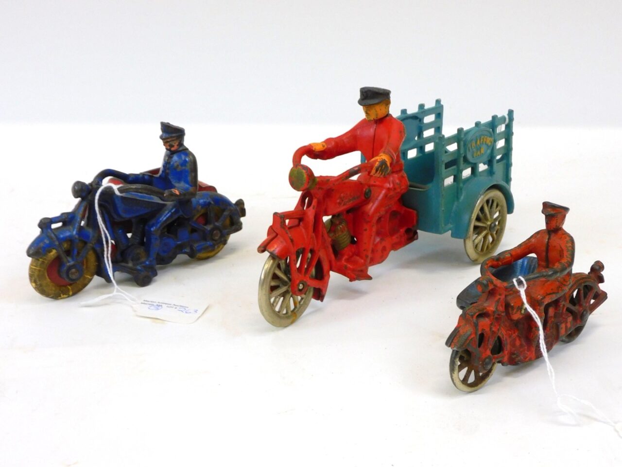 Three Cast Iron Motorcycles with Side Cars and Cart