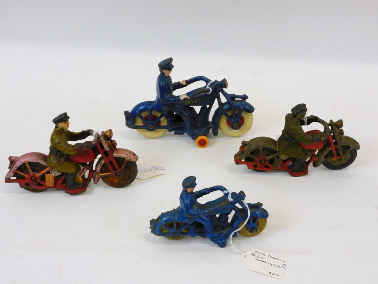 Collection of Cast Iron Police Motorcycles by Hubley and Champion