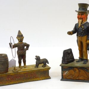 Mechanical Banks by Shepard Hardware Co. - Uncle Sam and Trick Dog