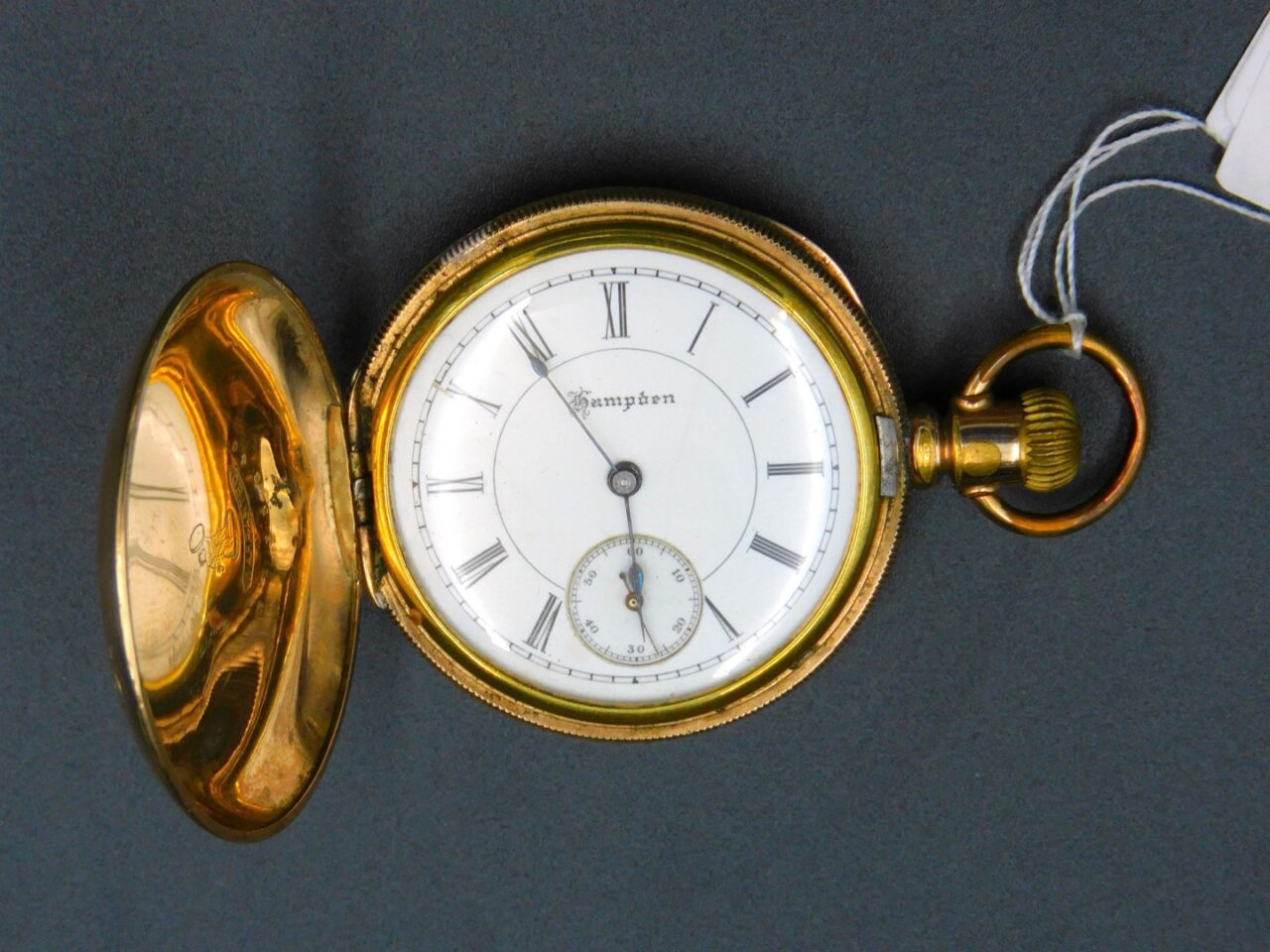 Hampden Ladies 19th Century 10kt Gold Pocket Watch with Enameled Face.