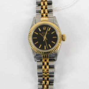 Rolex Lady's Oyster Perpetual Two-Tone Watch 18kt Yellow Gold Stainless Automatic 1980s Jubilee Bracelet.