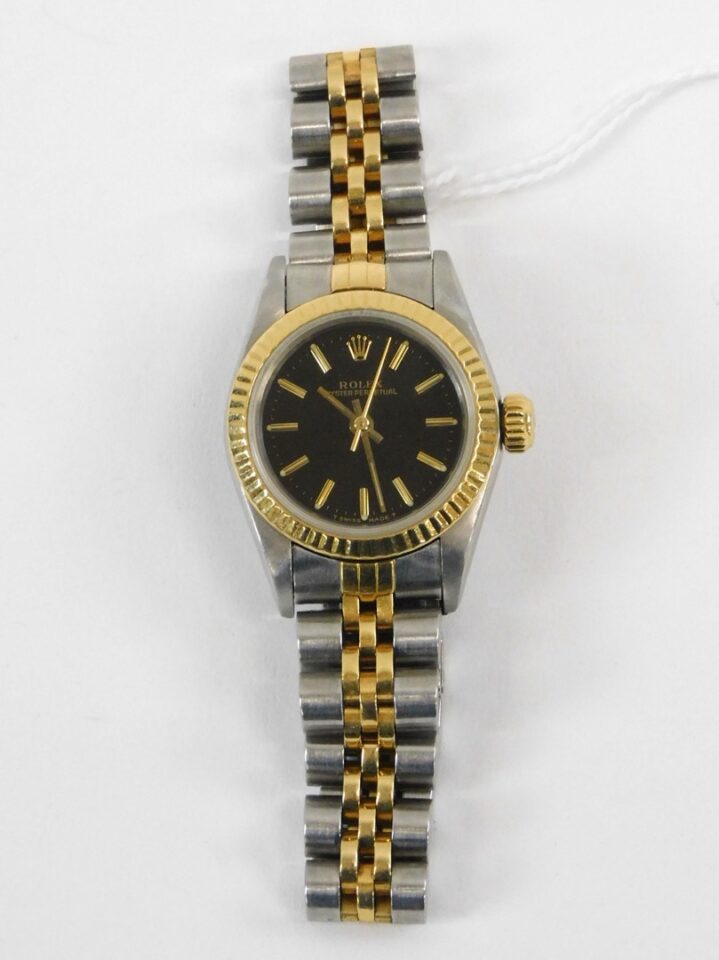 Rolex Lady's Oyster Perpetual Two-Tone Watch 18kt Yellow Gold Stainless Automatic 1980s Jubilee Bracelet.