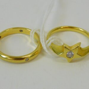 Two Gold and Diamond Rings by Unknown Artist. 20th Century. Eternity Band and Solitaire Ring in Star Design. Size 6.