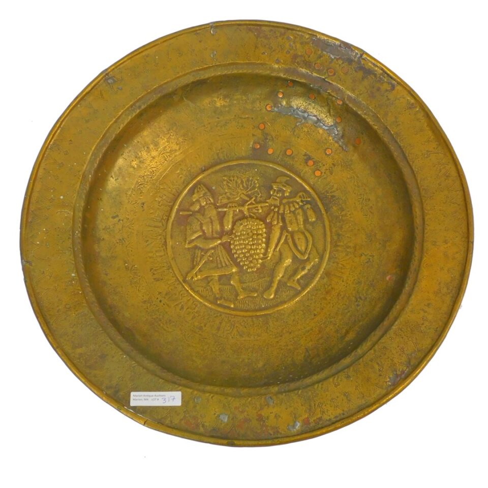 Embossed Alms Bowl by Unknown Artist. 16th / 17th Century. Gentleman Carrying Fruit. 17" Diameter. Early Brass Repair.