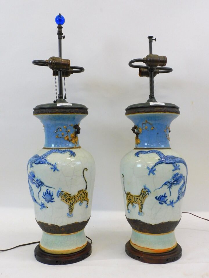 Pair of Chinese Export porcelain dragon and tiger motif vases mounted as lamps