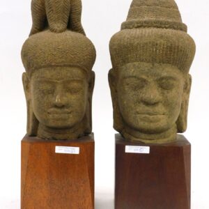 Khmer carved stone heads of Buddhist Deities