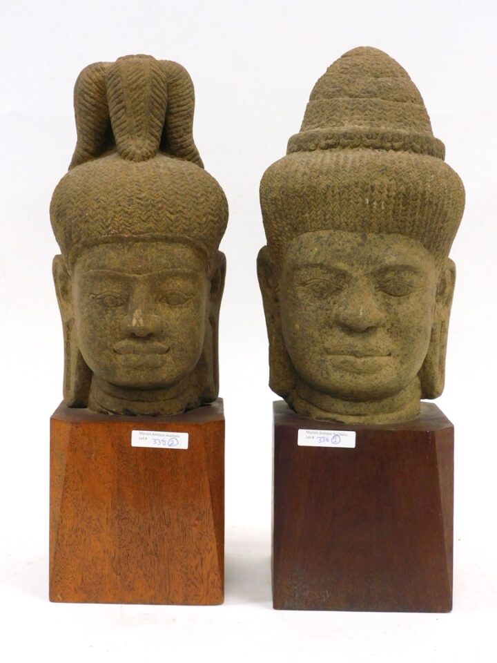 Khmer carved stone heads of Buddhist Deities