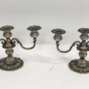 Pair of Francis I silver candelabras by Reed & Barton. Mid-20th century. Ornate embossed fruit design. Weighted base. 8" x 13".