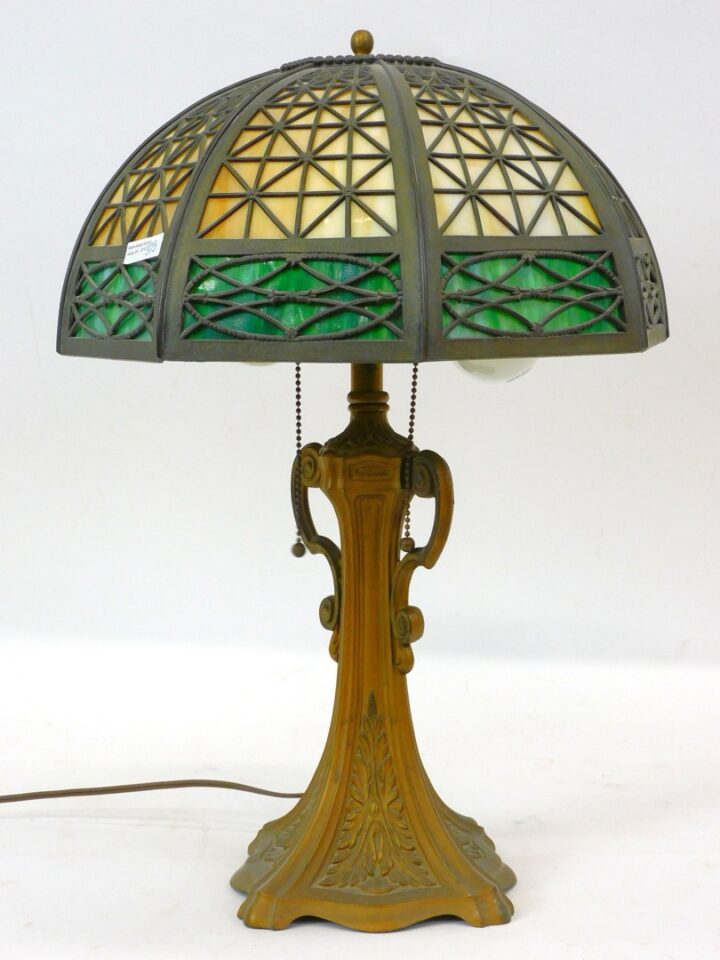 Tiffany Studios Bent Panel Table Lamp. Early 20th century. Green and caramel slag glass panels