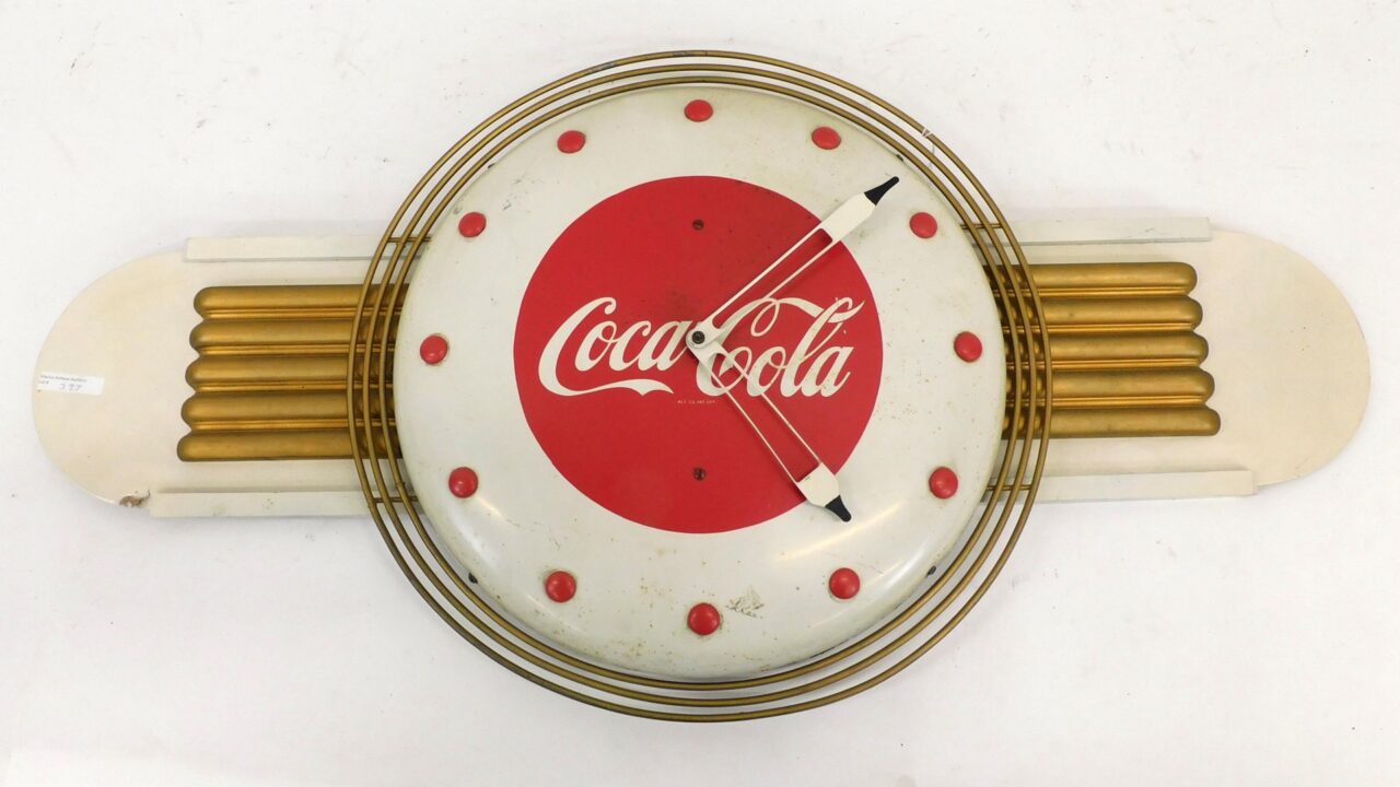 Coca-Cola Advertising Clock by Kaye Manufacturing Inc. Circa 1948 Metal and Masonite Wings 36" Wide 18 1/2" Diameter