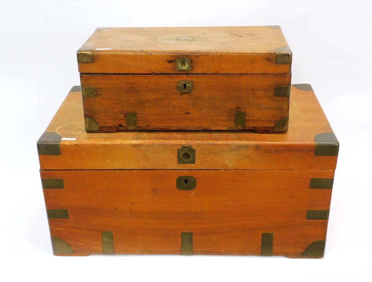 Pair of Brass Bound Camphor Chests by Unknown Artist. 19th Century. Lift-Top. Natural Finish. Handles. Staining