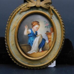 Antique Oval Porcelain Painting "Young Girl Sewing" by Unknown Artist