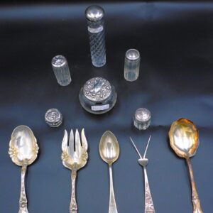 Sterling Silver Flatware and Glass Dresser Jars by Unknown Artist