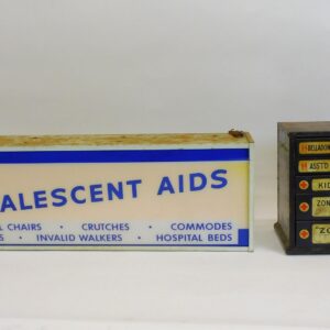 1959 Illuminated Convalescent Aids Sign & Early 20th Century First Aid Metal Cabinet in Auction Catalog.