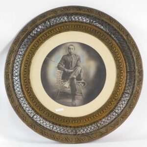 Photograph of Young African American Gentleman in Wicker Chair