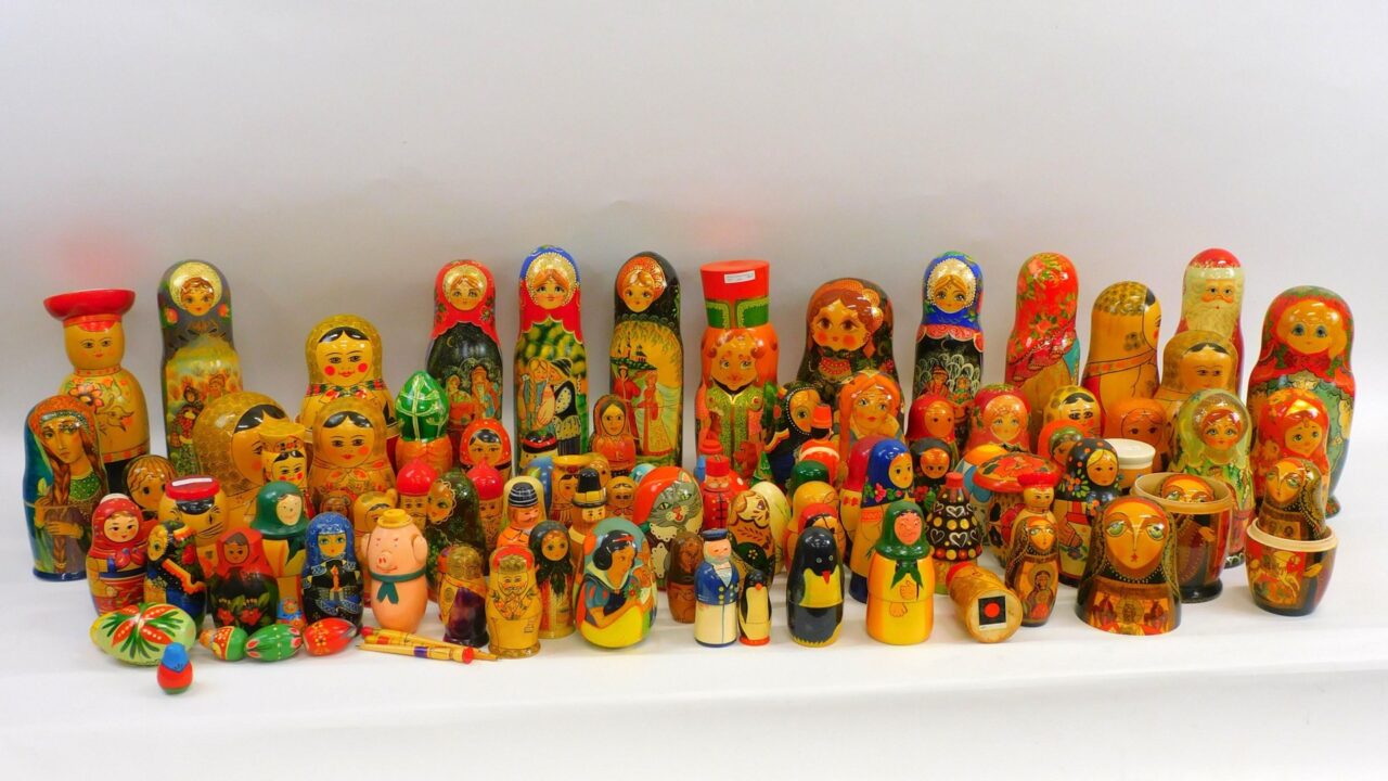 Large Collection of Modern Hand Painted Russian and Chinese Nesting Dolls