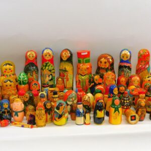 Large Collection of Modern Hand Painted Russian and Chinese Nesting Dolls