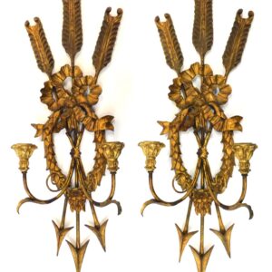 Pair of Regency-revival sconces by Unknown Artist. Early 20th century. Carved wood and gesso with gilt finish. Arrow