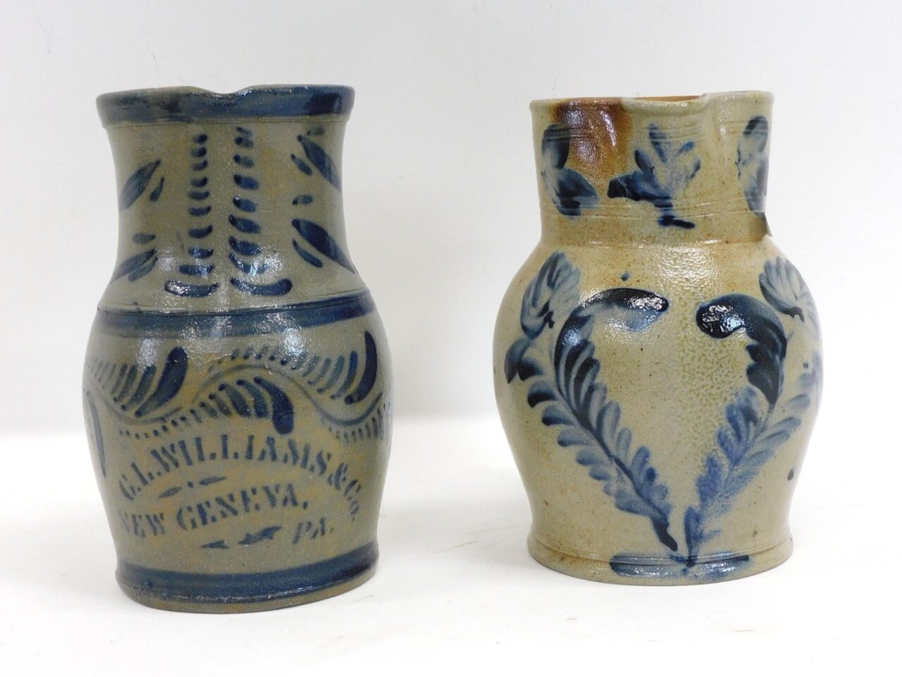 Pair of Stoneware Pitchers by G.L. Williams