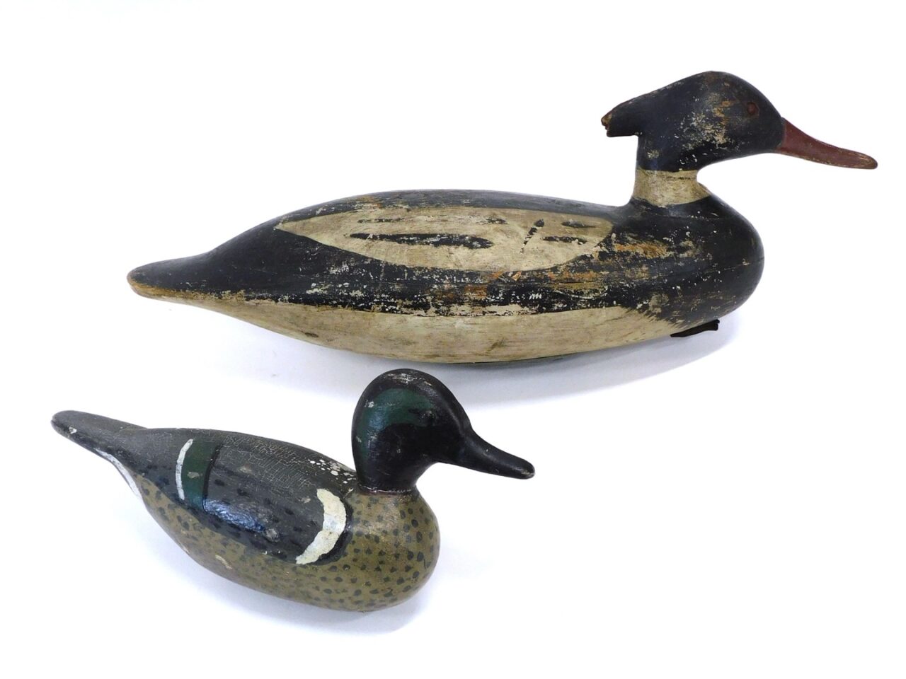 Carved Wooden Duck Decoys by Unknown Artist