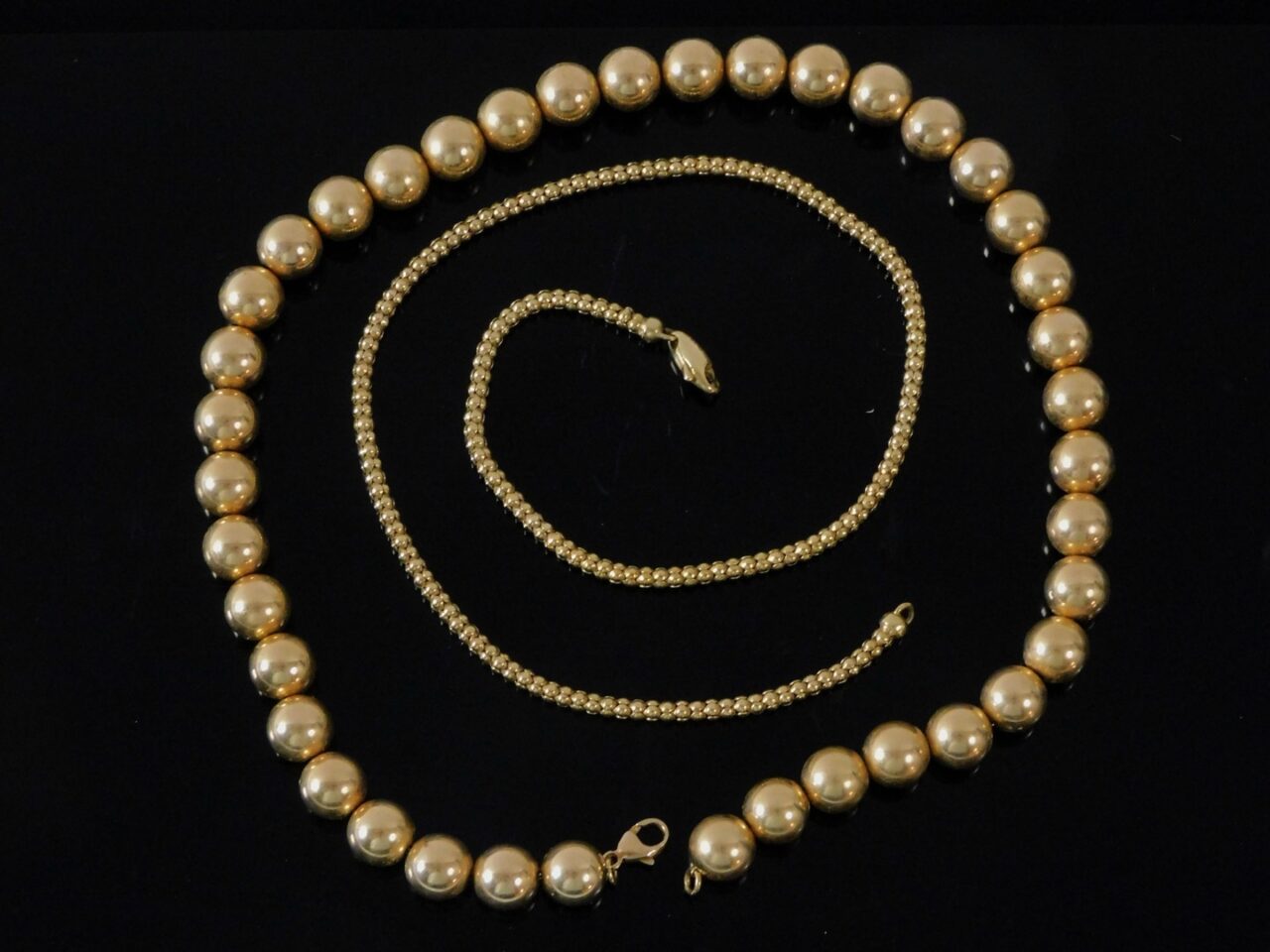 Two 14K Gold Bead Necklaces by Unknown Artist. Created in Unknown Date.