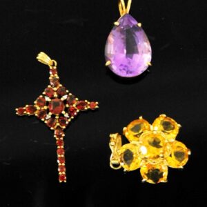 Three Gold Pendants with Amethyst