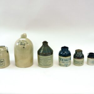 (7) Stoneware Advertising Jugs And Jars