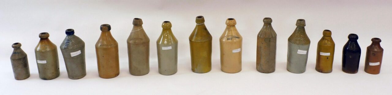 (13) Stoneware Bottles