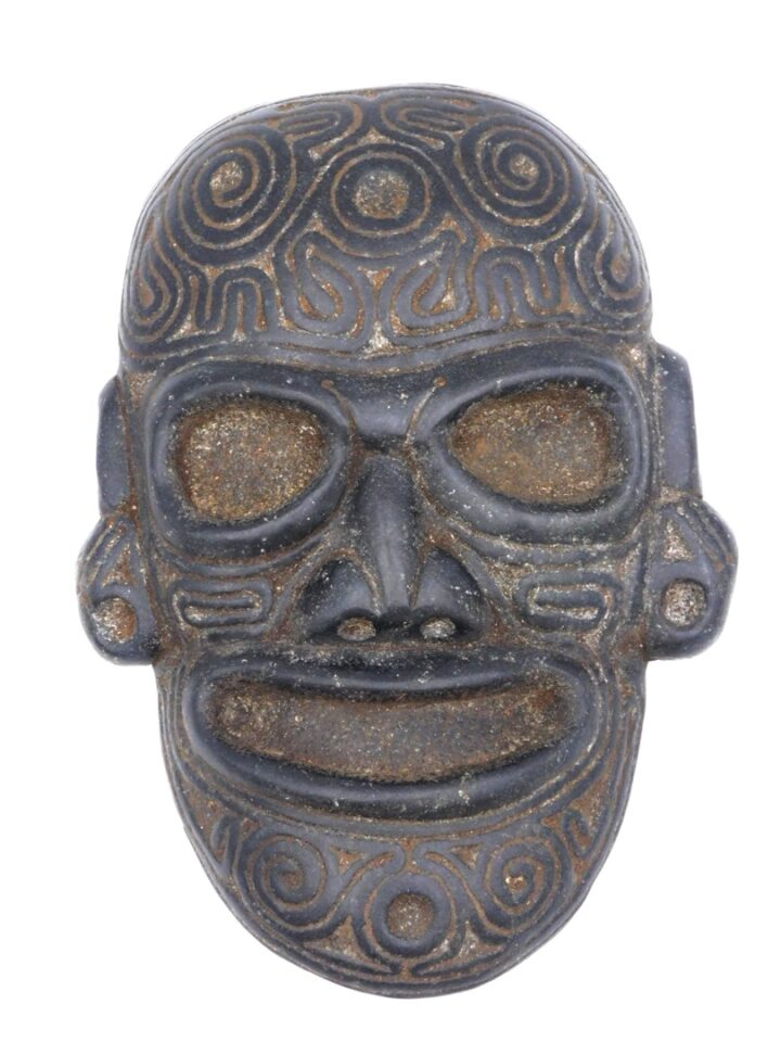 An Exceptional Carved Taino Mask.