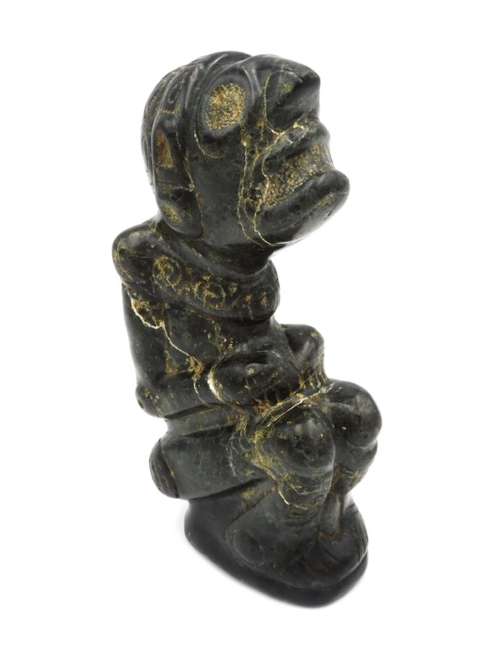 Taino Expressive Anthropic Statue by Unknown Artist. 600-1500 AD. Magnetite with spotted pattern