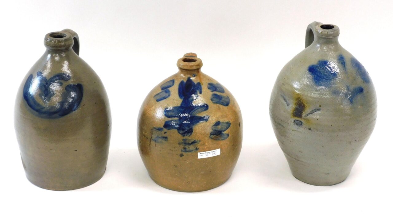 Three Blue Floral Decorated 19th c. One to Two Gallon Shouldered And Ovoid Jugs by Unknown Artist