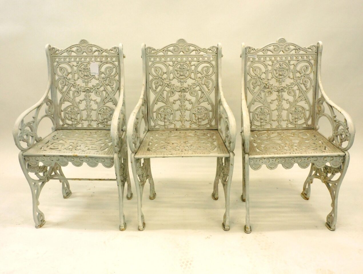 (3) Ornate Victorian Cast Iron Garden Arm Chairs.