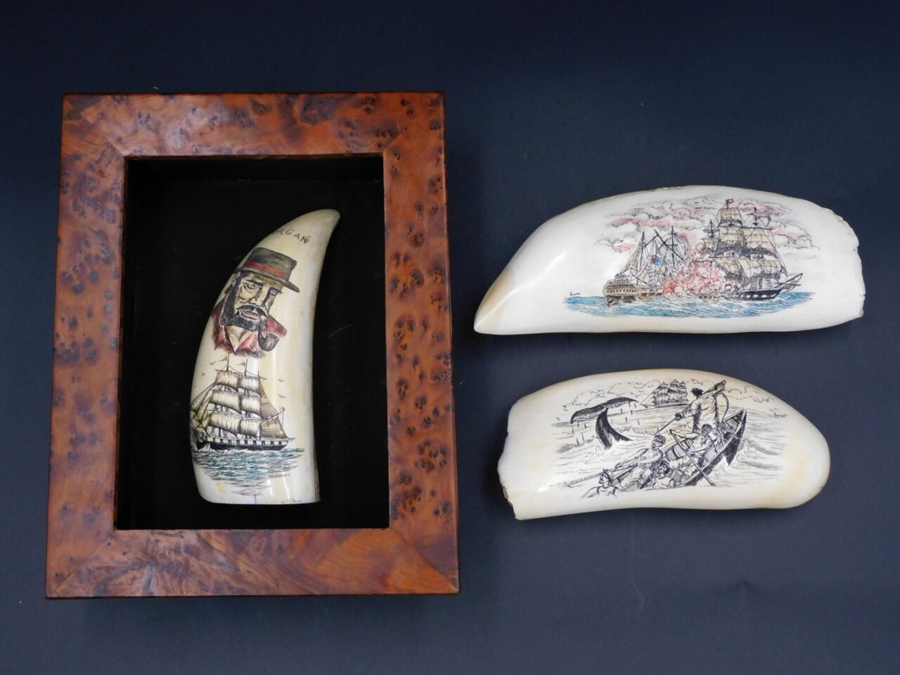 Three Contemporary Scrimshaw Sperm Whale Teeth by Unknown Artist