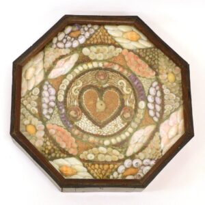 Elaborate Sailor's Valentine by Unknown Artist. 19th c. West Indies shellwork with heart motif in octagonal case.