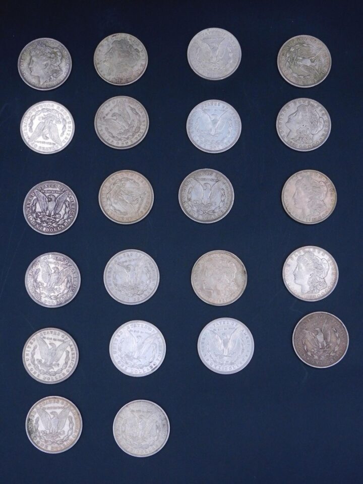 Collection of (22) 1921 D Morgan Silver Dollars in Very Good AU Condition by Unknown Artist.