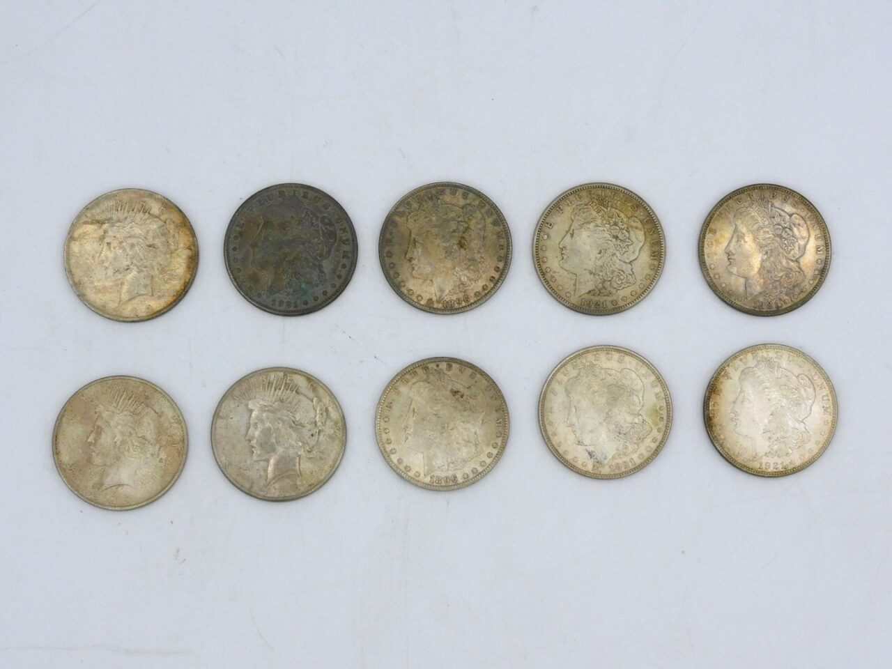 (10) US Silver Dollars.