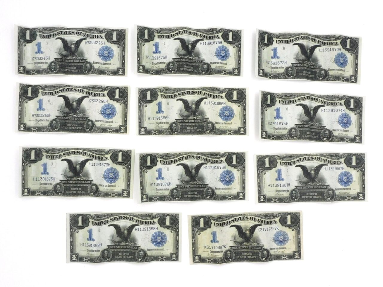 1899 Black Eagle Silver Certificates by unknown artist. Blue seal. Excellent uncirculated condition. Serial numbers H11391666-669H