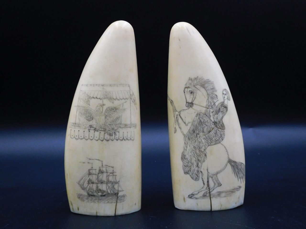 Pair of Scrimshaw Sperm Whale Teeth by Unknown Artist