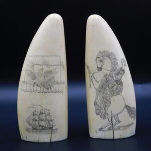 Pair of Scrimshaw Sperm Whale Teeth by Unknown Artist