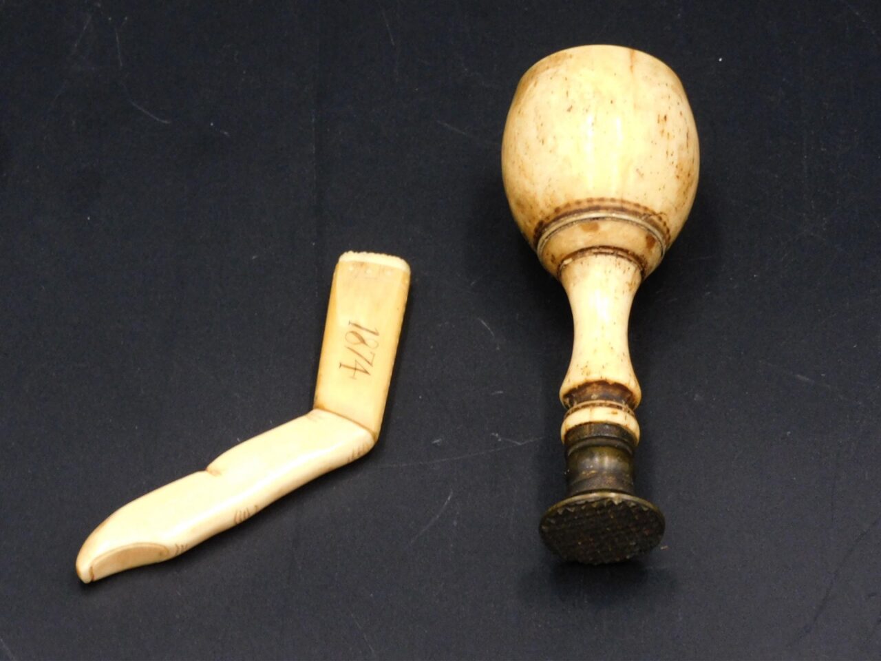 Pair of Scrimshaw Pipe Tampers by Unknown Artist